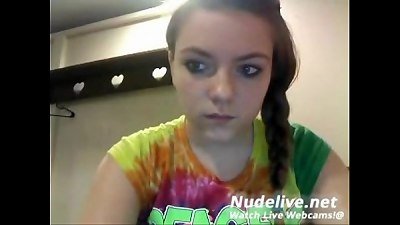 very cute first-timer undresses and plays with her taut beaver on cam