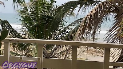 dark-hued wife shows vagina at a beach house